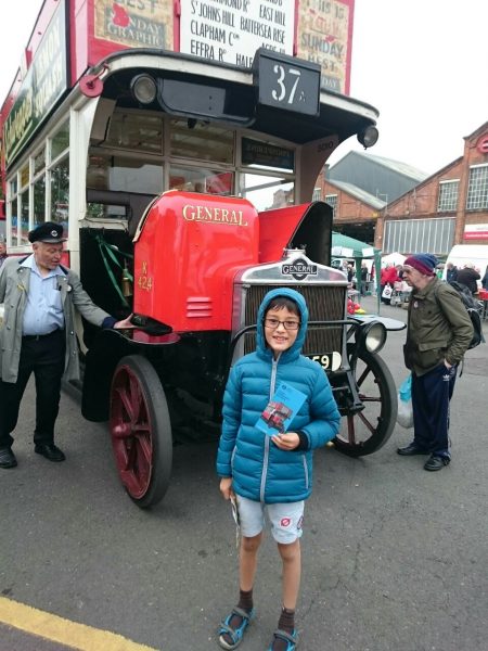 In front of an old bus