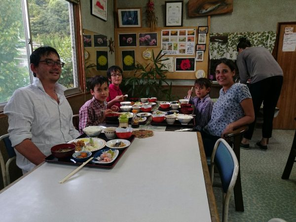 us eating a deliceous meal at Sunset beach